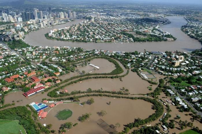 What are the long-term implications for Brisbane and other flooded areas after 2022 disaster?